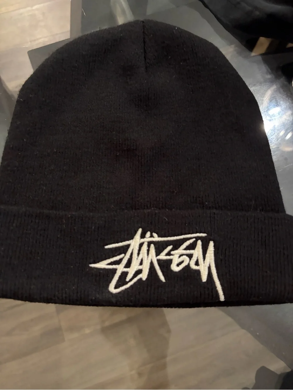 Stüssy Stock Cuff Beanie in black with an embroidered white logo.